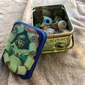 Antique box with  sewing threads